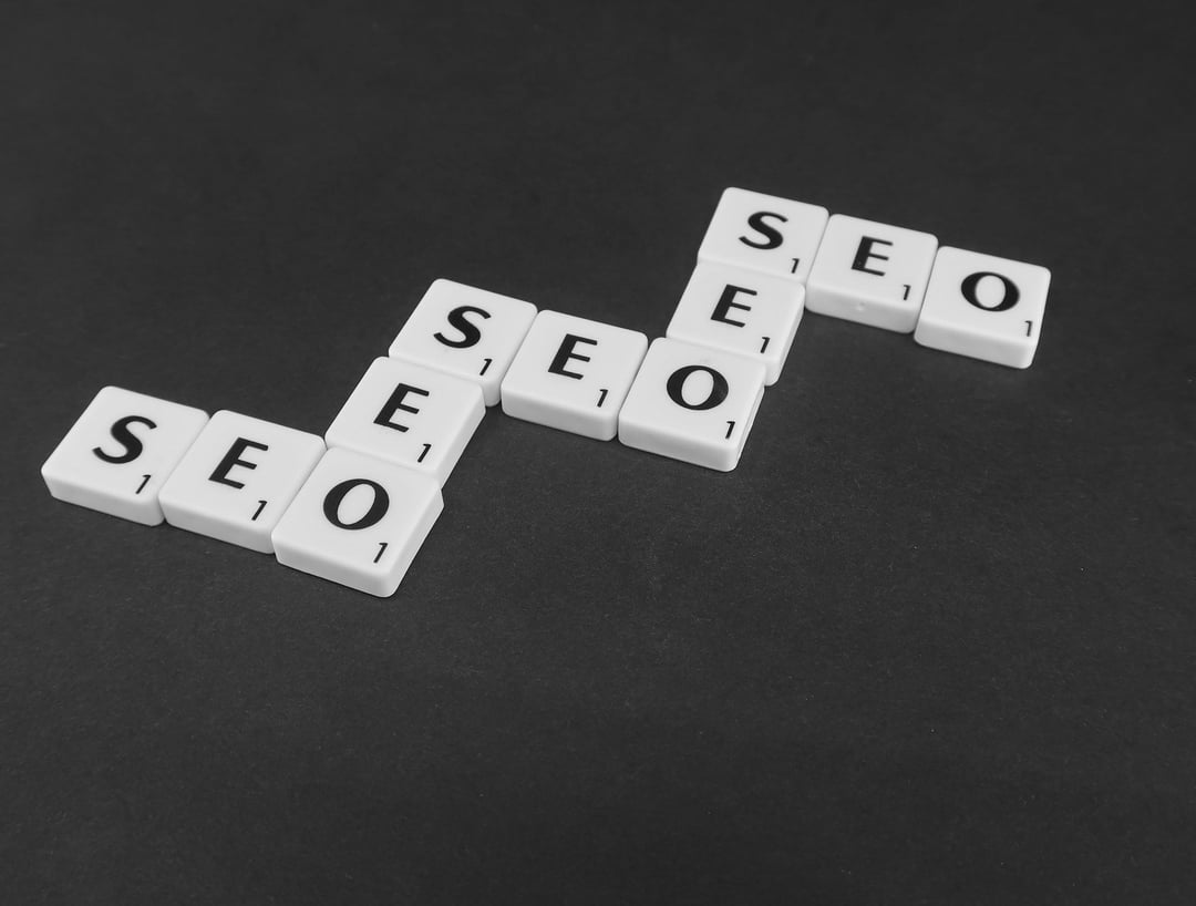 Scrabble tiles with the text SEO spelled out
