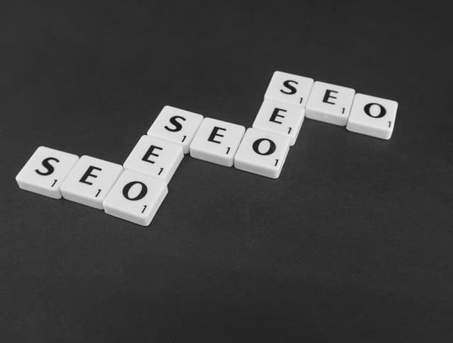 Scrabble tiles with the text SEO spelled out
