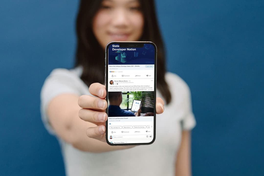 Person holding phone to viewer.