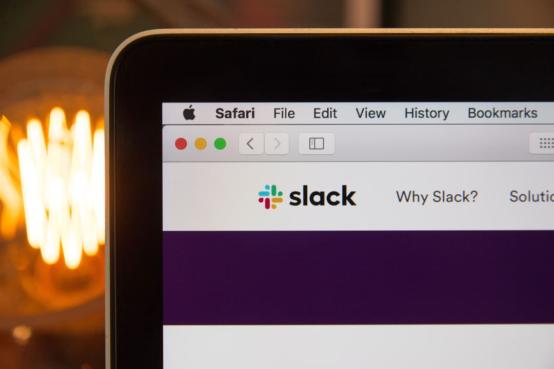 A picture of a Slack logo on a laptop screen.