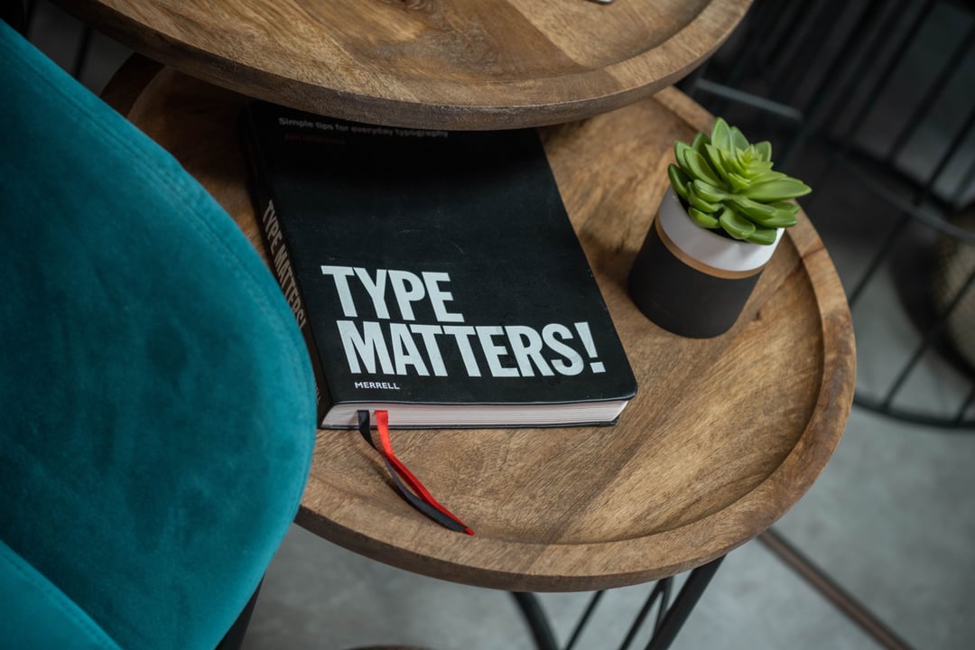 An image of a notebook that reads "Type Matters".